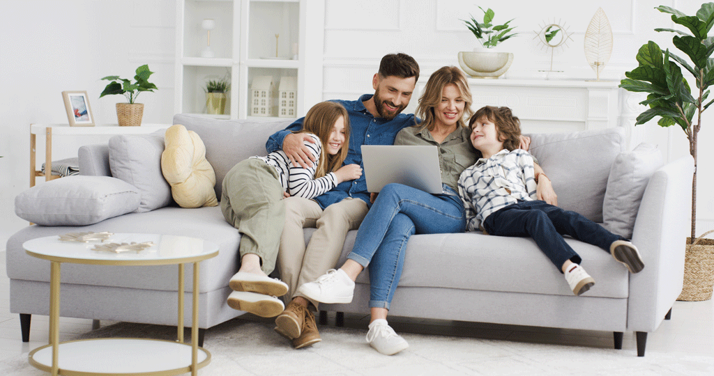 family sitting on couch | emergency electrician wilmington nc